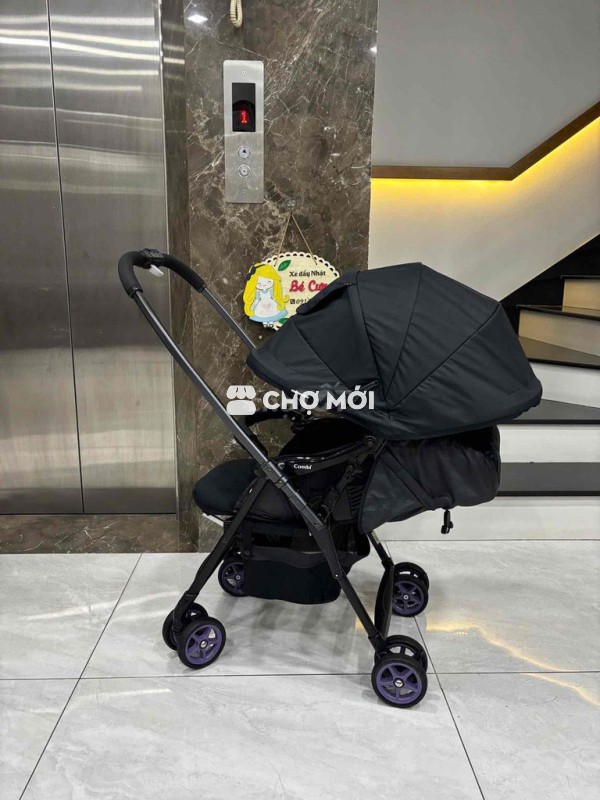 xe đẩy combi mechacal first white lable đen