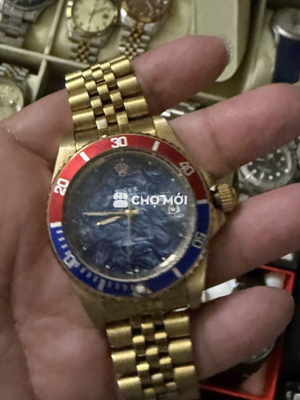 Đồng hồ RL thuỵ sỹ bọc vàng. Máy thuỵ bao bung