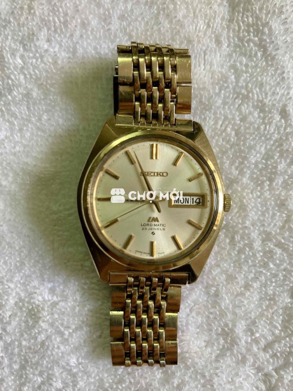 Đồng hồ hiệu seiko  LM  lắc kê vàng18 k (GP )không