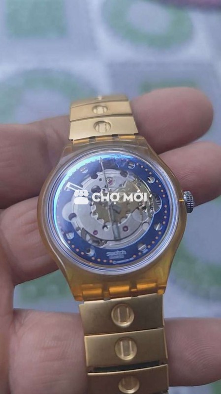 Đồng hồ Swatch Cơ lộ máy, mặt xanh, dây vàng