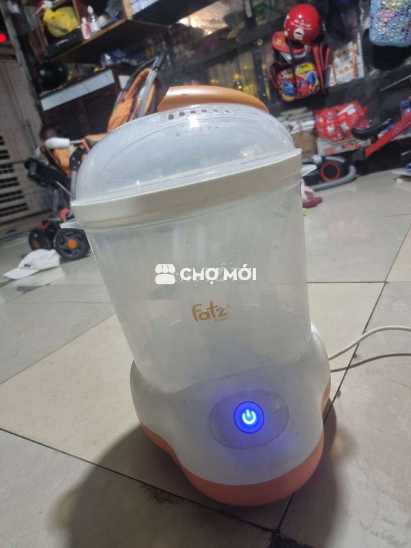 Máy sấy khô tiệt trùng  500k.và xe đẩy bé 300