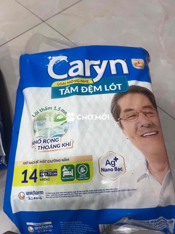 bỉm tã dán size Xl 10 miếng và miếng đệm lót 14m