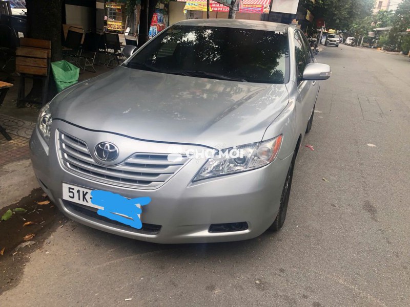 nhà cần bán xe Toyota Camry 2007 LE 2.4 nhâp từ Mỹ