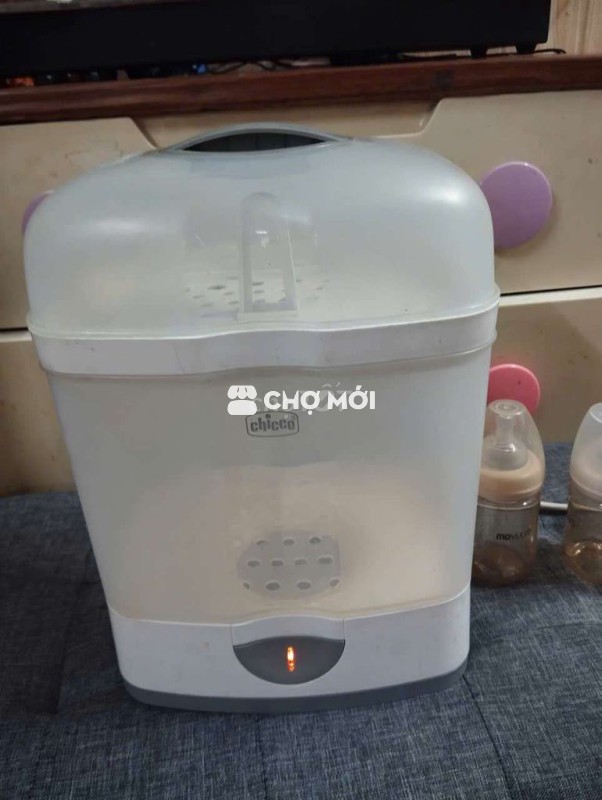 Máy tiệt trùng bình sữa Chi co còn sử dụng tốt