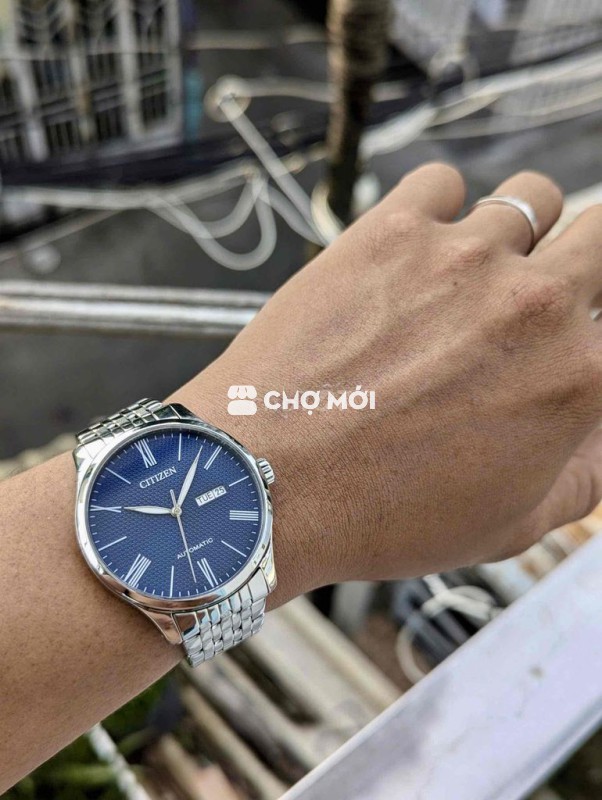 Đồng hồ Citizen automatic mặt xanh vân guiloche