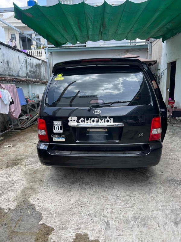 Kia Carnival 2009 GS 2.5 AT - 100000 km