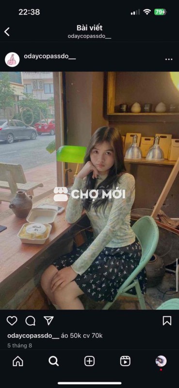 áo thun nữ co dãn xuyên thấu và chân váy nơ đen