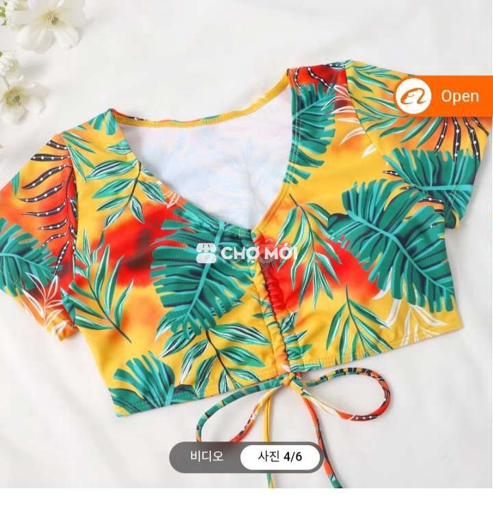 Tly 50c áo y hình giá 9k