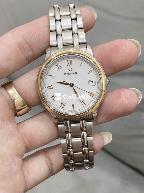 đồng hồ thuỵ sỹ niềng vàng đúc 18k