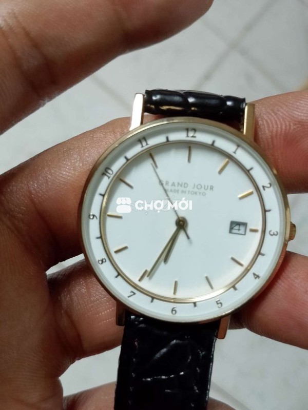 Đh nhật pin, bọc vàng, dây da bò mới