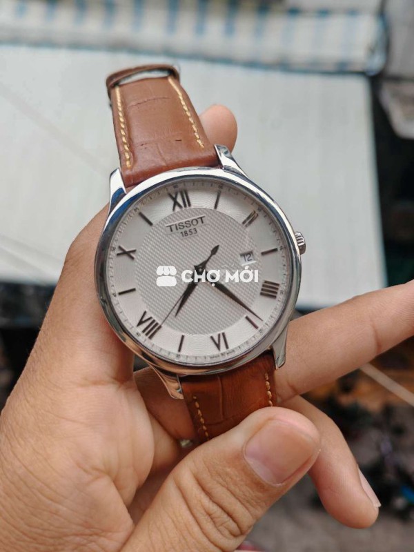 Tissot tradition chính hãng bán hay Giao lưu gl