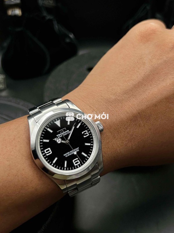 Đồng hồ Technos full thép mặt đen lôi cuốn kính sa