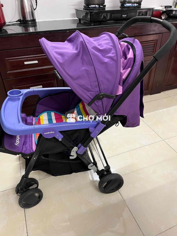 thanh lý xe đẩy cho bé màu tím