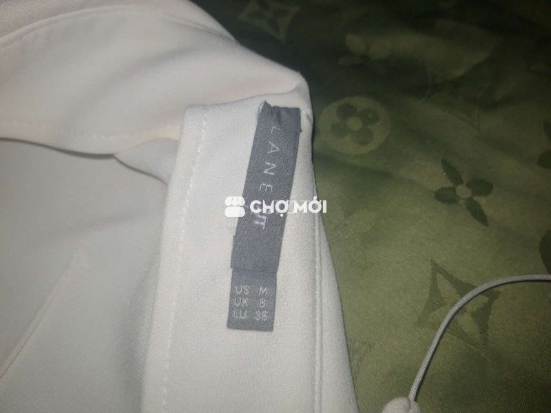 Áo khoác vest nữ Lane JT màu trắng kem