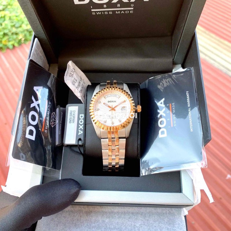 Doxa đính 8 viên kim cương mạ vàng hồng còn 17.8tr