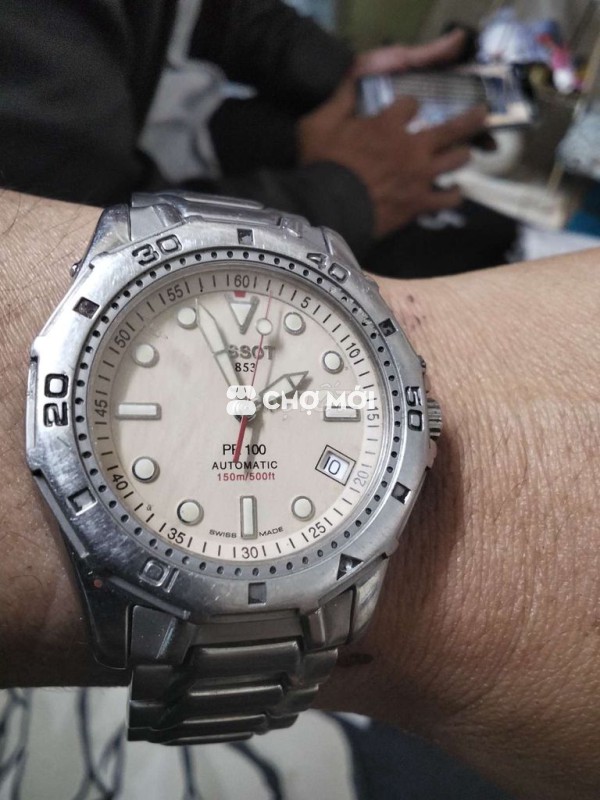 Đồng hồ Tissot PF 100 Nam Kim loại Bạc