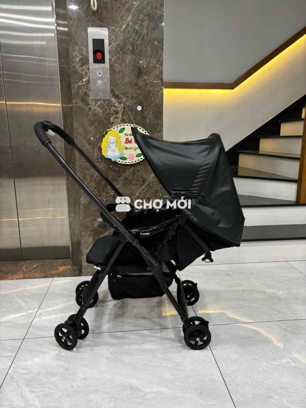 Xe đẩy trẻ em Combi Mechacal first EZ-360