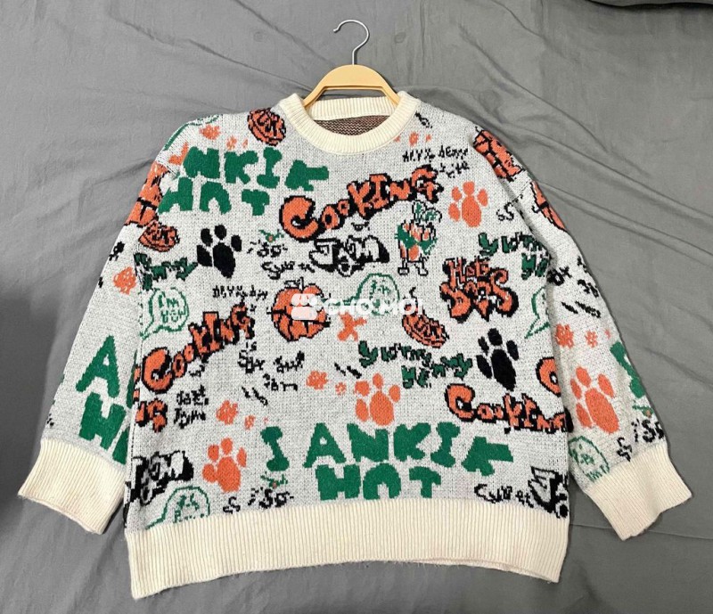 Áo len nữ cổ lọ xanh lá cây