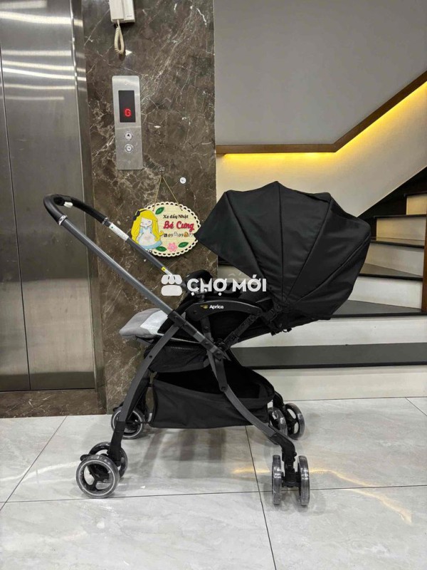 xe đẩy Aprica Luxuna Sofa Cushion đen xám 4cas