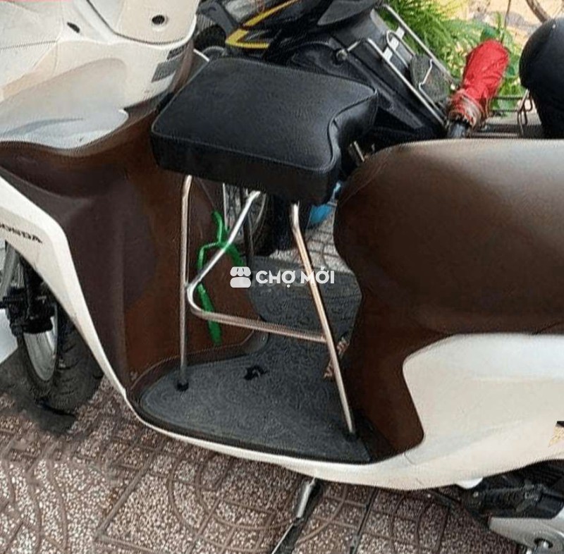 Ghế ngồi xe máy cho em bé