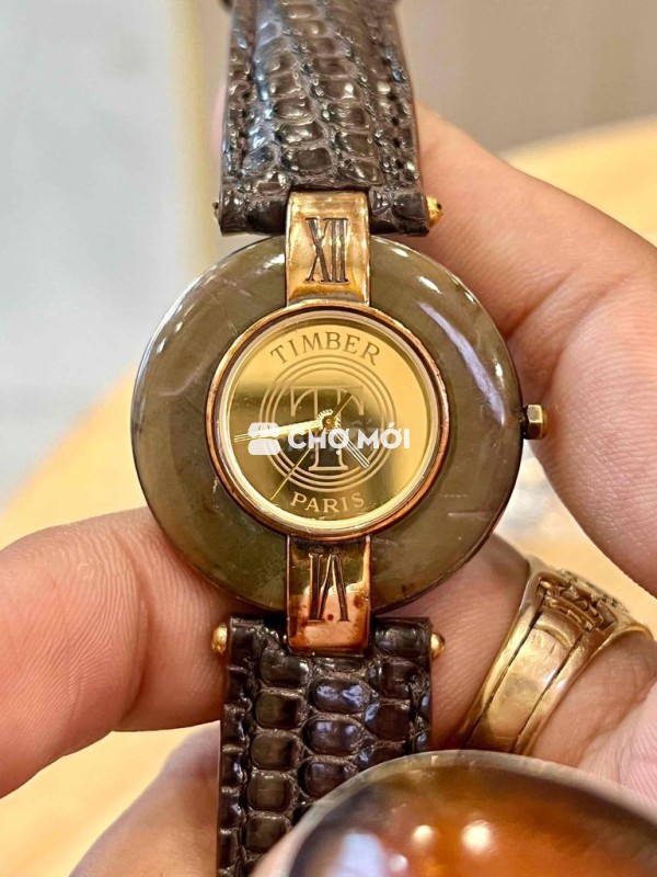Đồng hồ bạc khối ốp đá cẩm thạch chữ T Paris pin