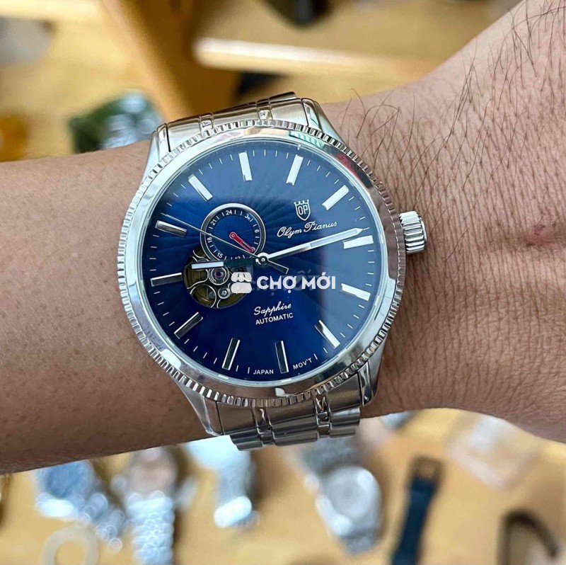 Đồng hồ Olympianus Nam 42mm automatic.
