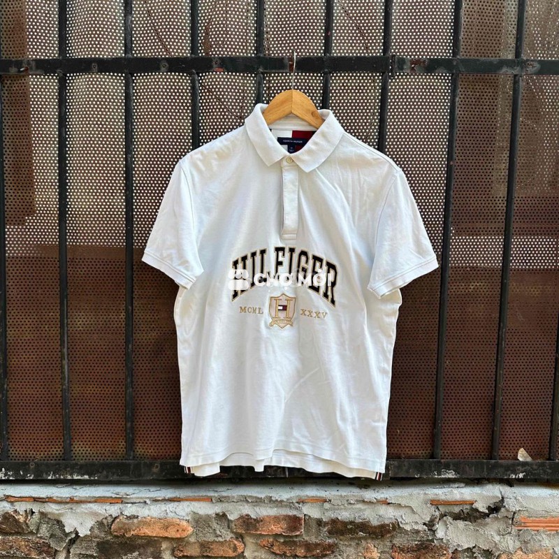 Polo tommy trắng logo to