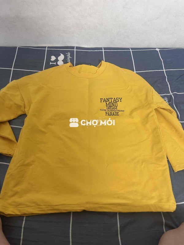 Áo len nữ vàng đã sử dụng