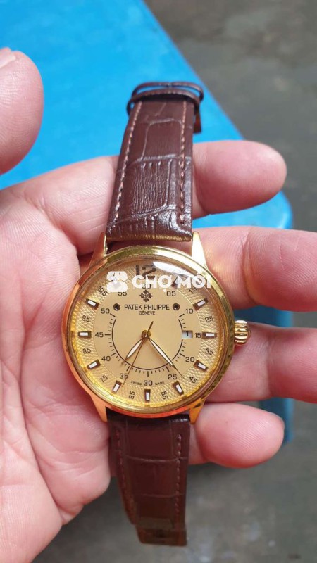 mình cần bán 1 cái đồng hồ máy chạy cơ size 38