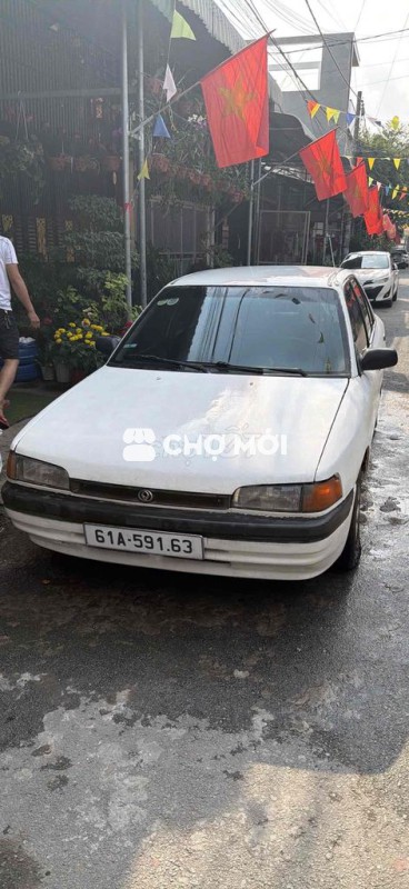 Mazda 323 1995 1.5 MT - 123456 km