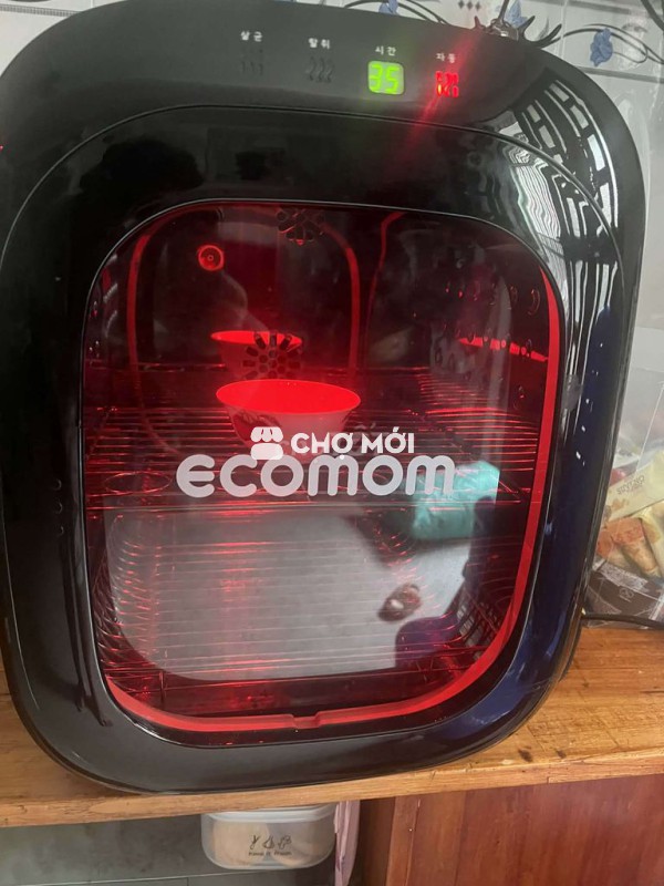 máy tiệt trùng bình sữa...